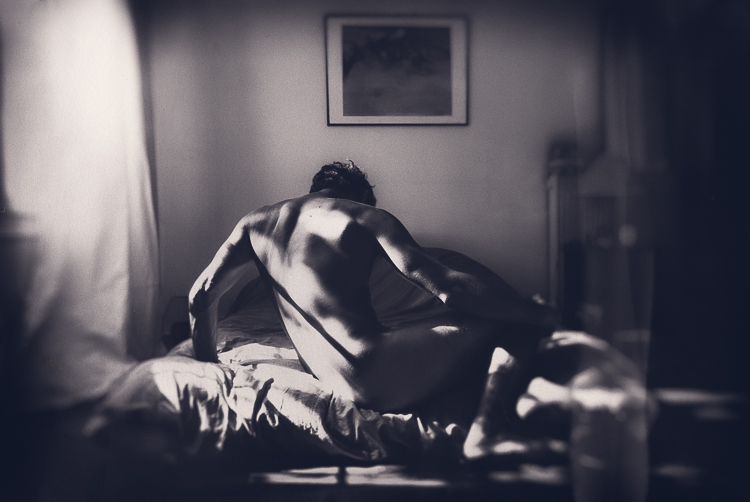 On the unmade bed